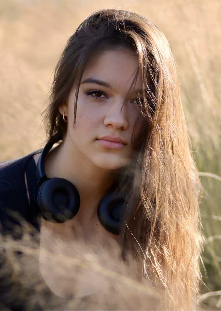 Close outdoor boxer portrait with red gloves
